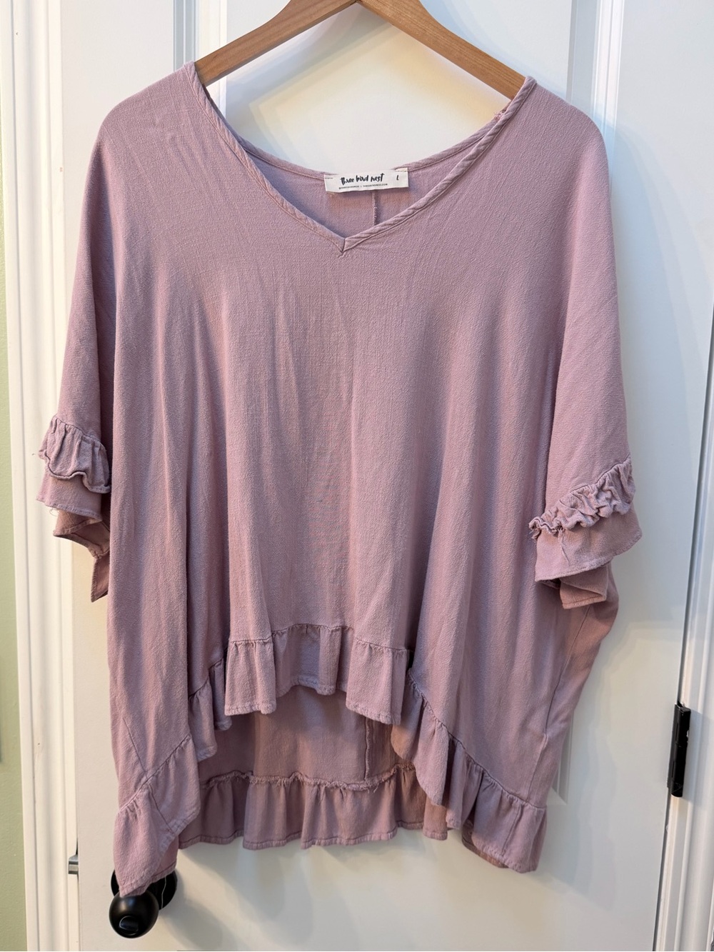 Three Bird Nest Ruffle Peplum Top